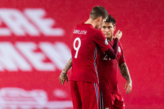 Alexander Sørloth and Mathias Normann of Norway celebrate