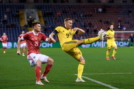 Andrei Mostovoy of Russia and Carl Starfelt of Sweden