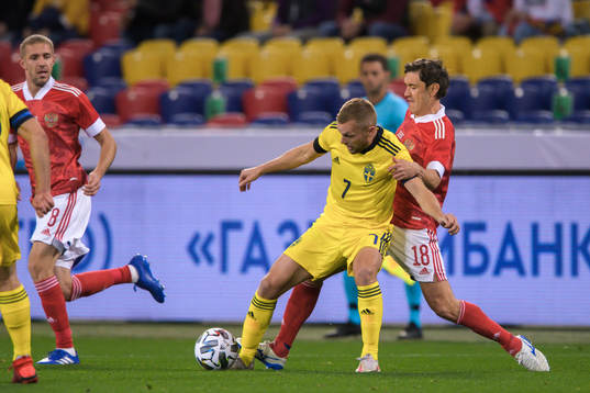 Sebastian Larsson of Sweden and Yuri Zhirkov of Russia
