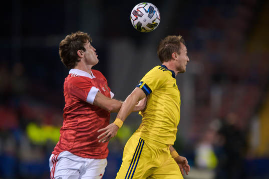 Mario Fernandes of Russia and Pierre Bengtsson of Sweden