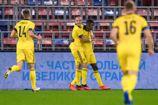 Sebastian Holmén and Alexander Isak of Sweden celebrate