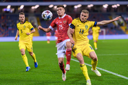 Andrei Mostovoy of Russia and Carl Starfelt of Sweden