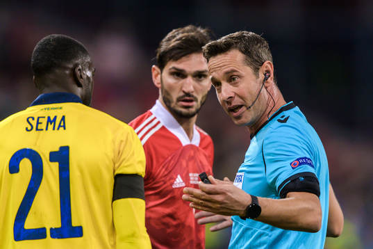 Ken Sema of Sweden and Magomed Ozdoev of Russia with