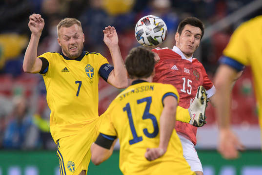 Sebastian Larsson of Sweden and Vyacheslav Karavaev of
