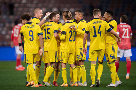 Players of Sweden celebrate with Mattias Johansson