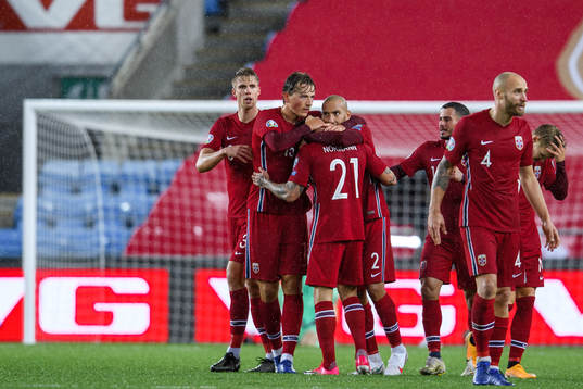 Mathias Normann of Norway celebrates with Sander Berge and