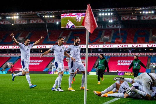 Luka Milivojevic, Dusan Tadic and Nemanja Gudelj celebrate