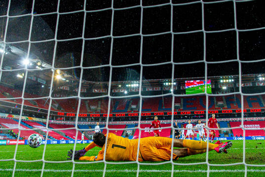 Goalkeeper Rune Almenning Jarstein of Norway with a save