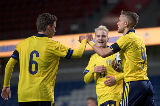 Max Svensson and Jesper Karlsson of Sweden celebrate the