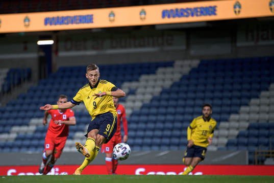 Jesper Karlsson of Sweden scores the 1-0 goal