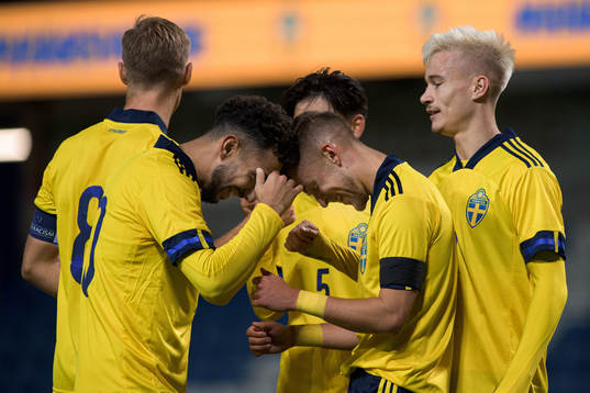 Daleho Irandust and Jesper Karlsson of Sweden celebrate the