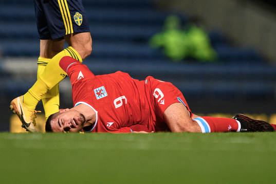 Alessio Curci of Luxembourg in pain