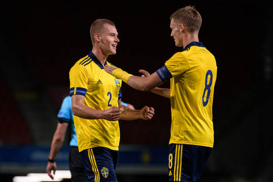 Felix Beijmo and Svante Ingelsson of Sweden celebrate the