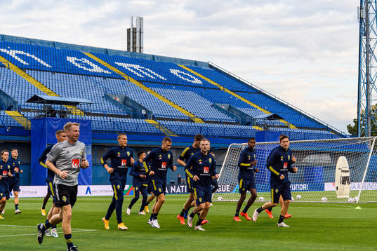 Players of the Swedish national football team warm up