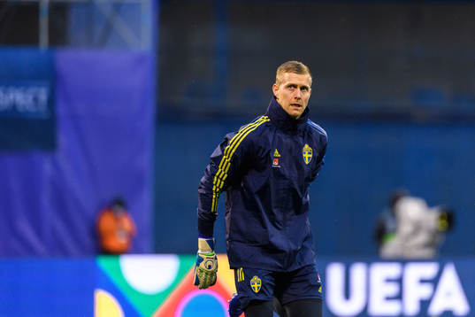 Goalkeeper  Karl-Johan Johnsson of Sweden