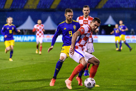 Marcus Berg of Sweden and Dejan Lovren of Croatia