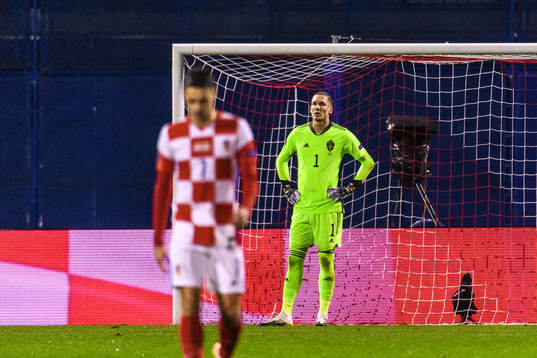 Goalkeeper Robin Olsen of Sweden looks dejected