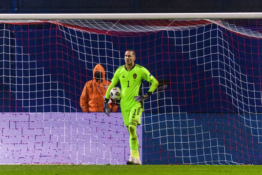 Goalkeeper Robin Olsen of Sweden looks dejected
