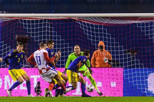 Nikola Vlasic of Croatia scores the 1-0 goal behind