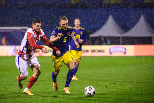 Mateo Kovacic of Croatia and Ludwig Augustinsson  of Sweden