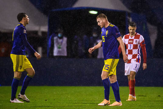 Dejan Kulusevski of Sweden looks dejected