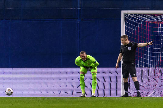 Goalkeeper Robin Olsen of Sweden in pain