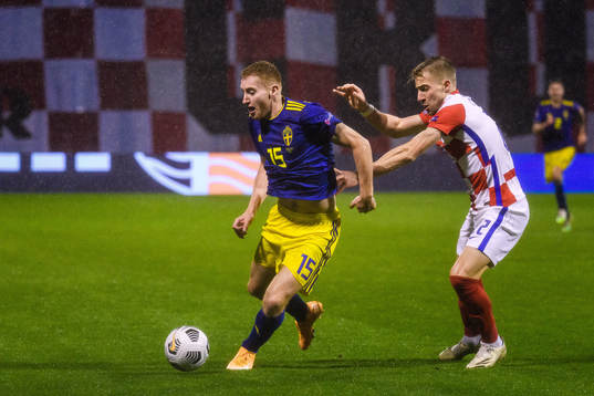 Dejan Kulusevski of Sweden and Dario Melnjak of Croatia