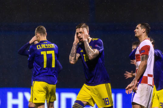 Pontus Jansson of Sweden looks dejected