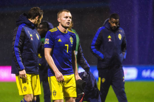 Sebastian Larsson of Sweden looks dejected