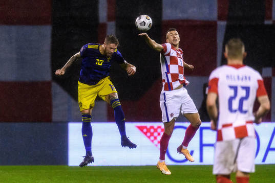 Pontus Jansson of Sweden and Andrej Kramaric of Croatia