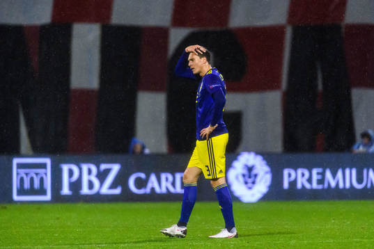 Victor Nilsson Lindelöf of Sweden looks dejected
