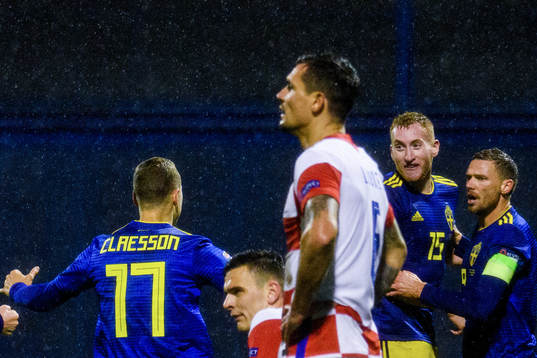 Viktor Claesson celebrates with Dejan Kulusevski and Marcus
