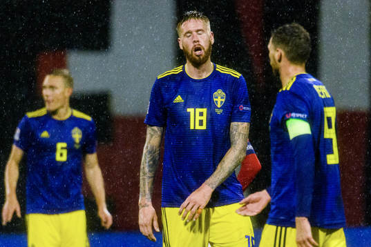 Pontus Jansson of Sweden looks dejected