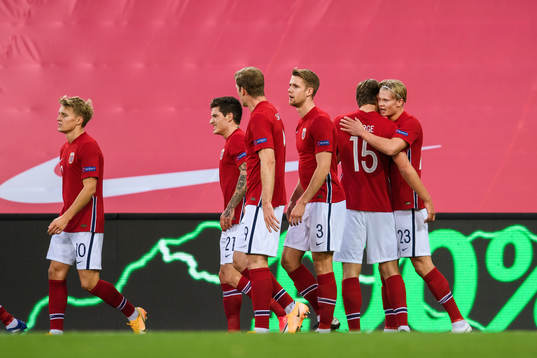 Erling Braut Haaland celebrate with Sander Berge of Norway