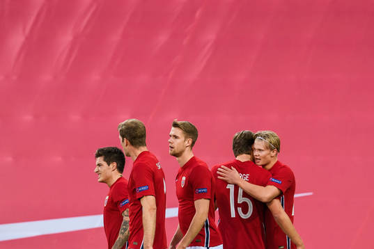 Erling Braut Haaland celebrate with Sander Berge of Norway