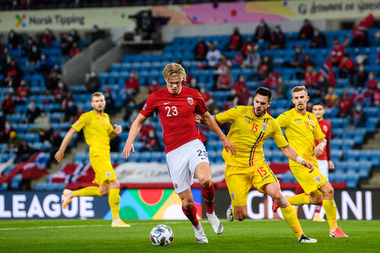 Erling Braut Haaland of Norway and Andrei Burca  of Romania