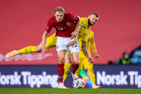 Erling Braut Haaland of Norway and Alexandru Cretu of