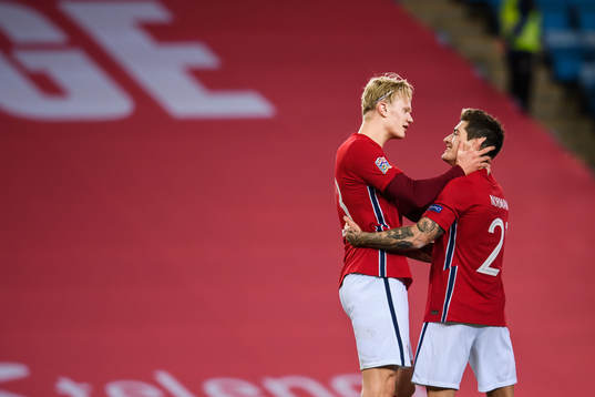 Erling Braut Haaland celebrate with Mathias Normann of