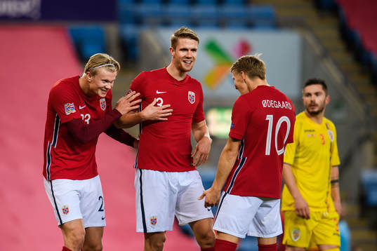 Erling Braut Haaland celebrate with Martin Ødegaard and