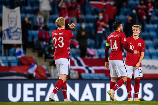 Erling Braut Haaland celebrate with Omar Elabdellaoui and