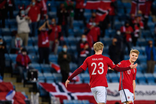 Erling Braut Haaland celebrate with Martin Ødegaard of