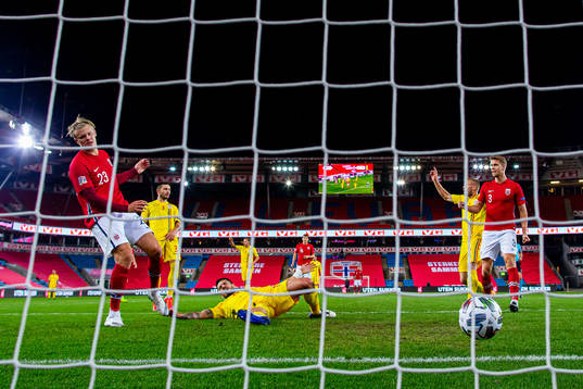 Erling Braut Haaland of Norway scores the 3-0 goal
