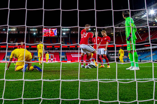 Erling Braut Haaland of Norway celebrates with teammates