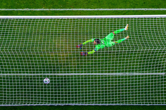 Goalkeeper Ciprian Tatarusanu of Romania lets in the 2-0