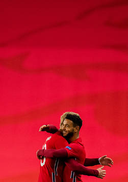 Erling Braut Haaland of Norway changes with teammate Joshua