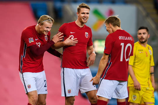 Erling Braut Haaland celebrate with Martin Ødegaard and