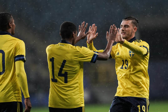 Paulos Abraham and Felix Hörberg of Sweden celebrate the