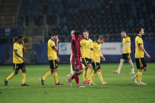 A players of Armenia looks dejected