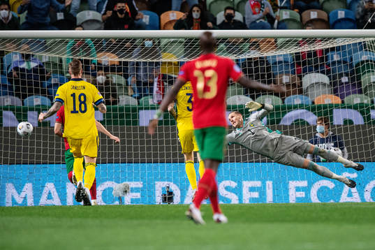 Bernardo Silva of Portugal (not in picture) scores 1-0