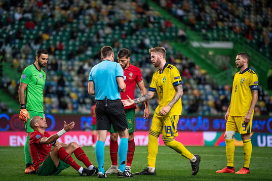 Pepe of Portugal and Pontus Jansson of Sweden